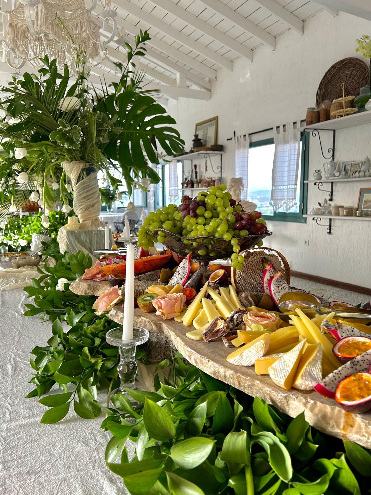 Outdoor banquet being arranged at golden hour at Chef's Atelier